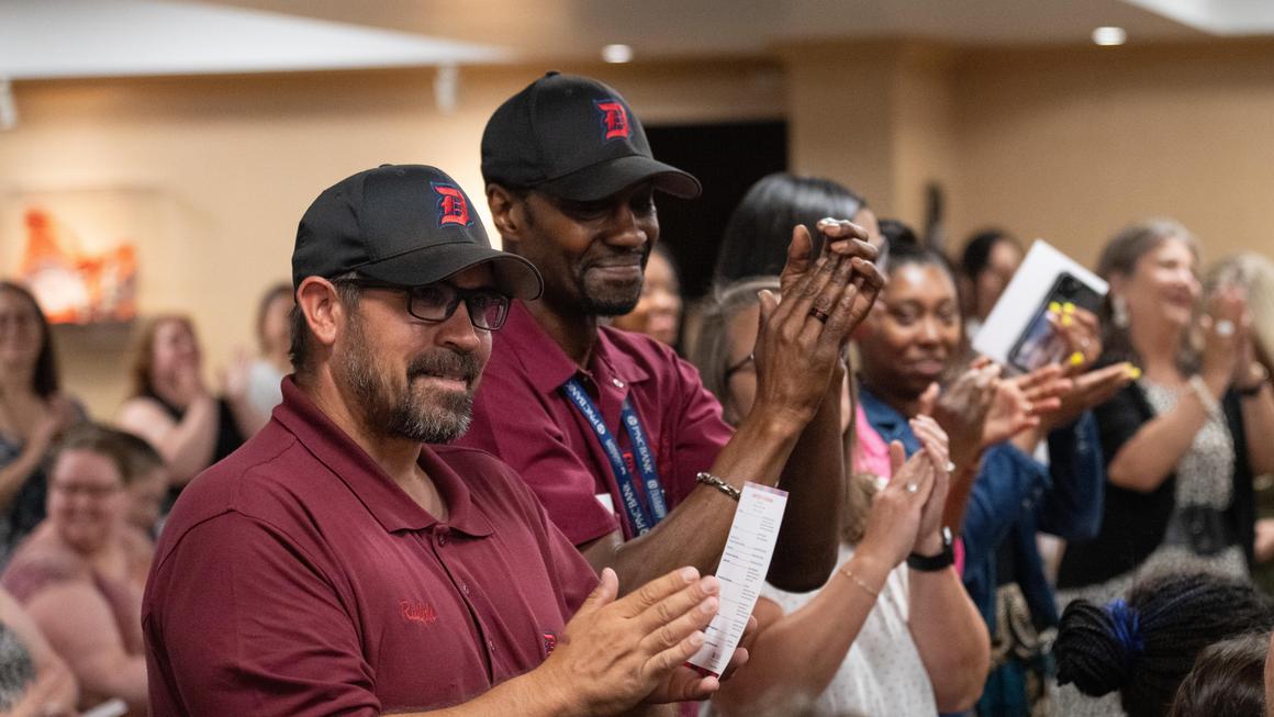 Duquesne's dining staff claps during the steel drum performance at Juneteenth 2024.