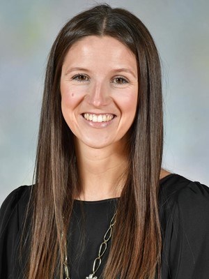 Extern Madison Ervin Hahesy smiling in a headshot.