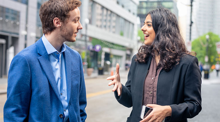 Male and female young professionals in downtown Pittsburgh